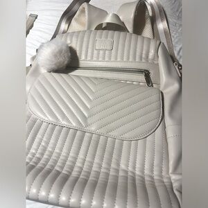 Elegant Cream Backpack with Pom Pom